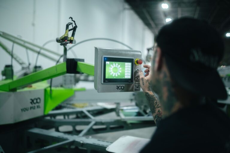 Screen printing production floor at From The Ashes in Naples, Florida